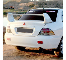 Бампер задний с отверстиями в цвет кузова Mitsubishi Lancer IХ (2000-2010)