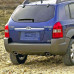 Купить Бампер задний в цвет кузова Hyundai Tucson 1 (2004-2010) под две трубы и расширители в Казани